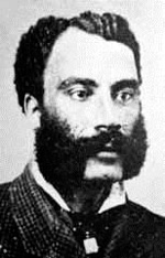 Photo of John Jackson, a black man, with a mustache/sideburn combo beard.