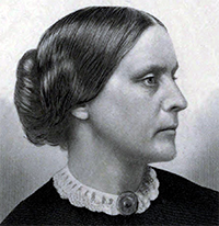Profile of Susan B Anthony, her hair in a bun, wearing a black dress with a lace collar and a broach at the center.