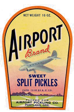 Airplaine flying over field with trees in background. Reads "Airport brand sweet split pickles"