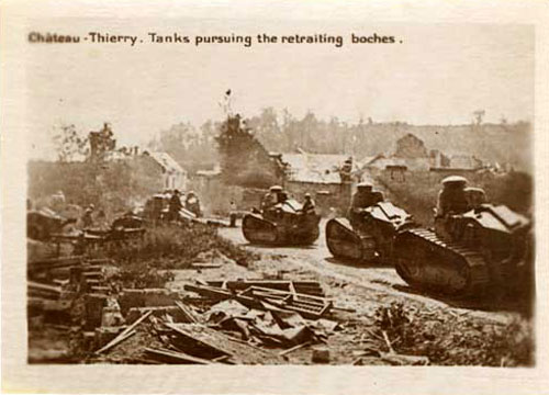 Photo of tanks in village during world war I