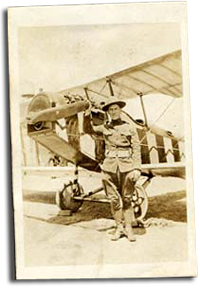 Charles P. Hoffman in front of his airplane.