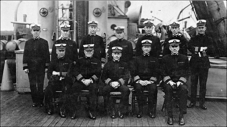 Officers of Mine Squadron One on deck of ship.
