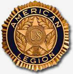 An American Legion gold badge. Circle shaped with a star in the center and "American Legion" writen around the circumfrence.