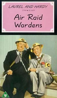 Photo of Laurel and Hardy with the headline "Air Raid Wardens" over the top. 