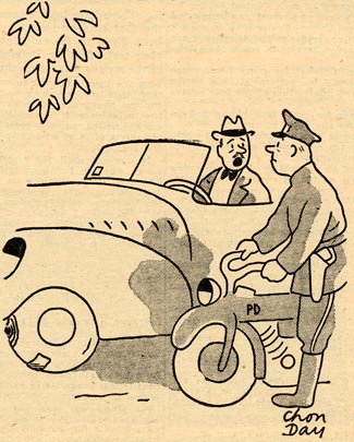 Man in a car talks to a policeman on a motorcycle.