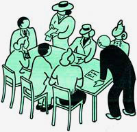 8 people gather around a table to hold a meeting.