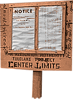 Sign with "notice" at top & "Tule Lake Project Center Limits" below. Rest of the text is not readable though some seems Japanese