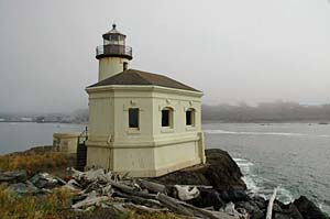 Lighthouse on a rock outcrop along the oregon coast.