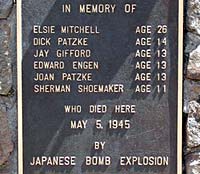 Wall plaque reads "in Memory of" and the 6 names who died May 5, 1945 by Japanese bomb explosion.