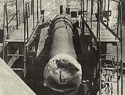 Cannon shown with steel scaffolding for walking along at the sides.