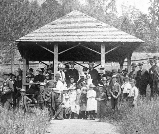 Crowd of about 30 people under a gazebo in 1880 in Sodaville.