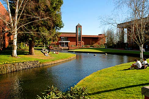 Willamette University building with stream running in front.