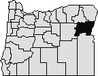Map of Oregon with Baker county blacked out in the northeast side.