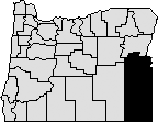Outline of State of Oregon with southeastern corner blocked out to indicate Malheur County.