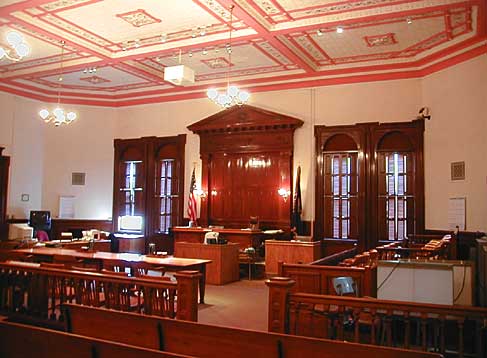 2nd floor courtroom with audience seating and judge's bench.
