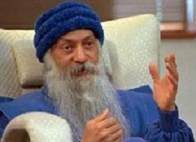 Bhagwan Shree Rajneesh: a gray haired man with a long beard and wearing a robe.
