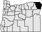 Map of the state of Oregon with Wallowa county in the northeast corner blacked out.