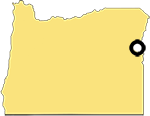 Shape in the state of Oregon with a marker in the far eastern section of the state showing the location of the town Dead Ox Flat