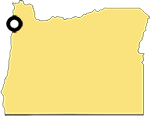 Shape of the State of Oregon with a marker in the north west on the coast indicating the location of the town of Bayocean.