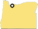 Shape of the State of Oregon with a marker in the north mid-west area indicating the location of the town of Bridal Veil.