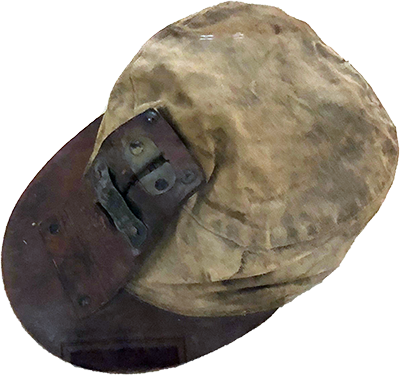 Miner's cap with front brim with leather mount for a lamp. 