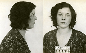 Mug shot of Lillian Dyer in a floral print dress with prisoner number 11174