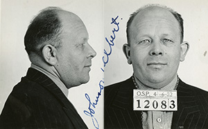 Mug shot of Albert Johnson with prisoner number 12083.