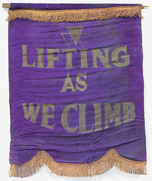 A banner with the words: Lifting as we Climb