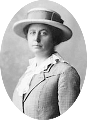 Photo of Marie Equi wearing a Boater Hat & double brested jacket.