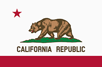 California flag has a grizzly bear walking on green grass, a red star in the upper left, and a red stripe below the bear. California Republic is written between them.