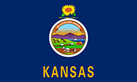 Kansas flag has the Kansas state seal on a dark blue background. Above the seal is the state crest; a sunflower resting on a twisted blue and gold bar. 