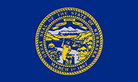 Nebraska flag has the state seal on a dark blue background. 