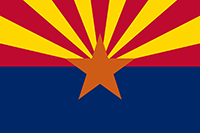 Arizona flag has a copper star in the center with 13 gold and red beams or rays extending up and out. The bottom half of the flag background is blue.