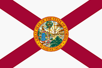 Florida flag is the state seal centered on a red cross on a white background.