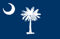 South Carolina flag has the state tree, sabal palmetto, in the center. In the top left corner is a crescent moon. The background is dark blue.