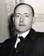 Photo of Gov. Sprague in suit and tie.