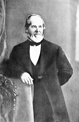 George Abernethy in suit and tie.