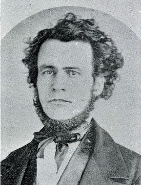 Portrait of Samuel Thurston with curly hair and a chinstrap style beard.
