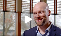 Image of Kris Stenson from video talking about records management.