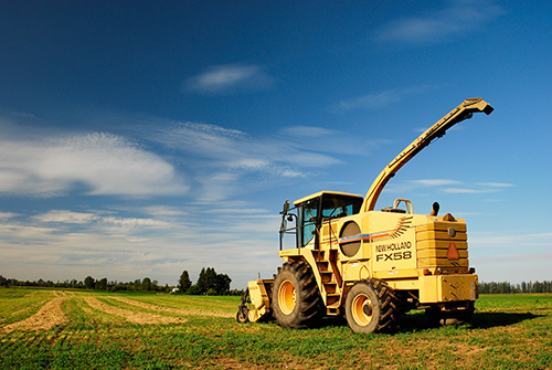 Farm machinery in a field.