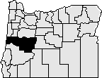 Map of Oregon with section in western middle blacked out to show Lane County.