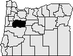 Map of the state of Oregon with Linn county in the northwestern section blacked out.