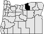 Map of the state of Oregon with Morrow county in the north middle of the state blacked out.