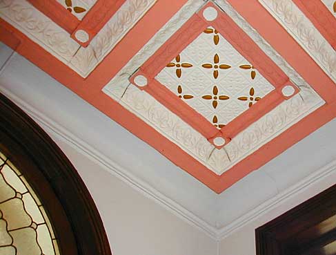 ceiling on 1st floor of courthouse has tile design.