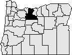 Map of the state of Oregon with Wasco county on in the mid northern area blacked out.