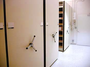 Shelving units with spinning handles on ends.