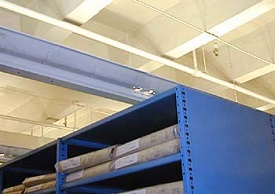 Ceiling of the storage area at the Archives shows the lights facing up, away from records.
