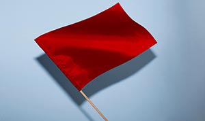 Red flag against blue background