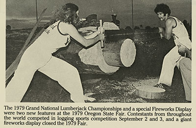 Competitors saw through a log