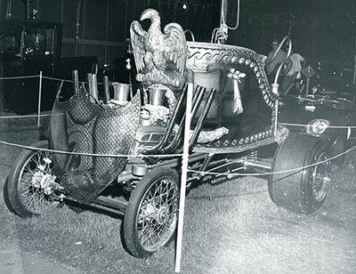 A chariot-like car at a custom car show